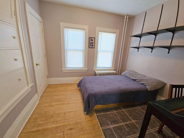 1001 Humboldt Ave W, Saint Paul, MN 55118 - bedroom featuring baseboards and light wood-style flooring
