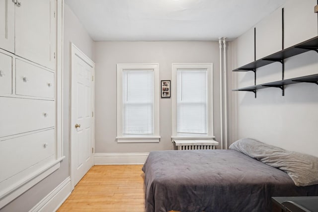 1001 Humboldt Ave W, Saint Paul, MN 55118 - bedroom featuring baseboards and light wood-style flooring