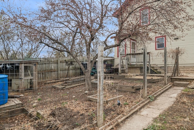 1001 Humboldt Ave W, Saint Paul, MN 55118 - view of yard with a garden and fence