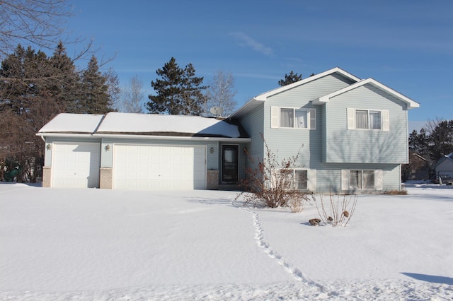 split level home featuring an attached garage