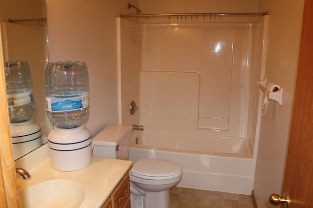 bathroom featuring toilet, bathtub / shower combination, and vanity