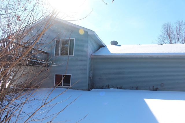 view of snow covered property