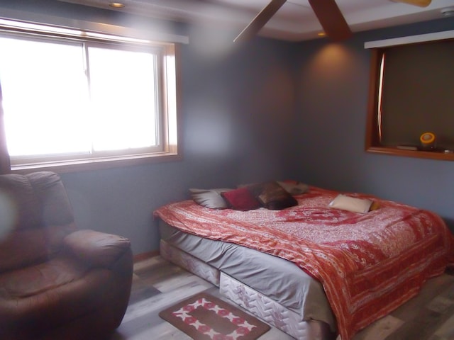 bedroom with wood finished floors