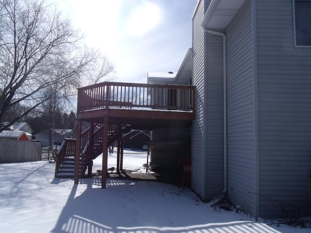 exterior space with stairs and a wooden deck