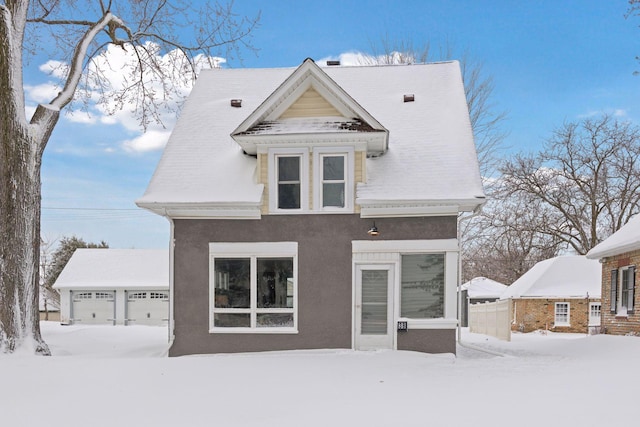 view of front of house featuring a garage and stucco siding