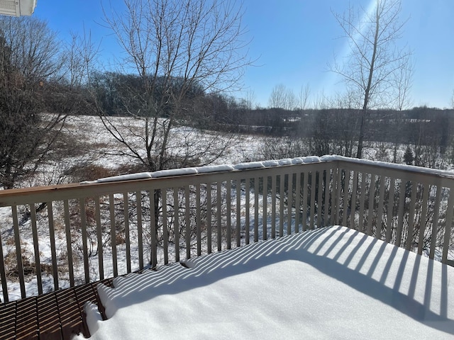 view of snow covered deck