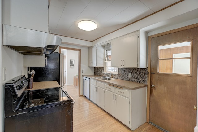 kitchen featuring range with electric stovetop, white cabinets, light countertops, ventilation hood, and dishwasher