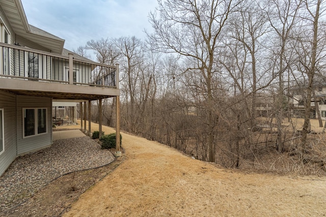 view of yard with a patio and a deck