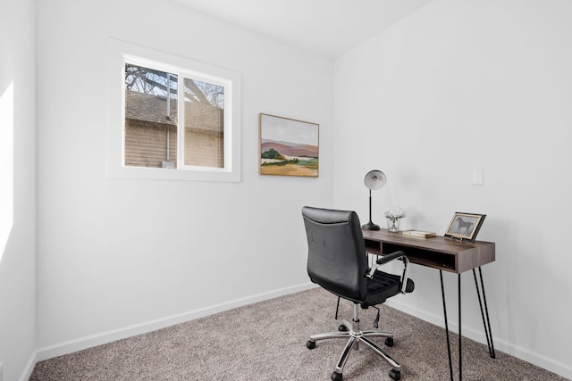 carpeted office with baseboards