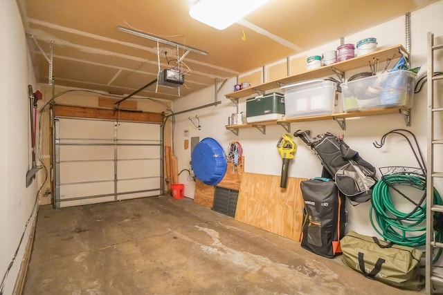 garage featuring a garage door opener