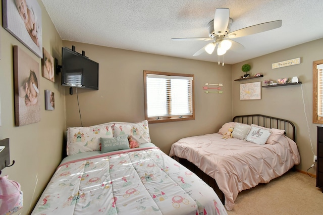 19241 Ebony Rd, Osakis, MN 56360 - bedroom featuring a ceiling fan, carpet, and a textured ceiling