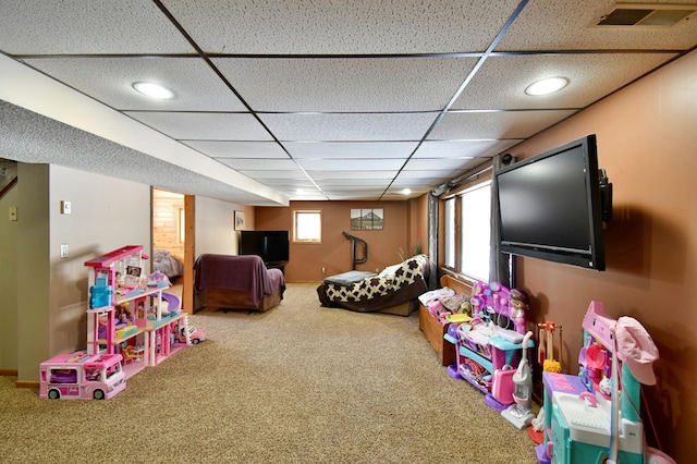 19241 Ebony Rd, Osakis, MN 56360 - recreation room with carpet flooring, a paneled ceiling, and baseboards
