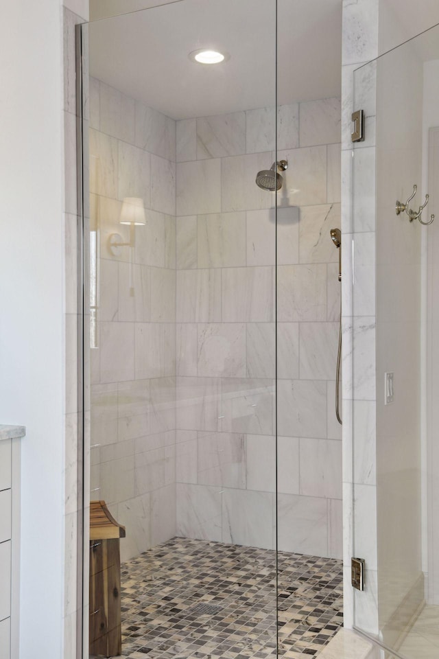 bathroom featuring a stall shower