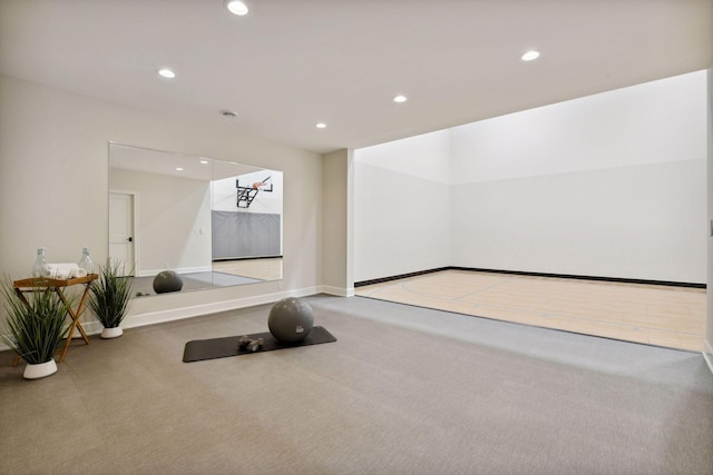 workout area featuring carpet floors, recessed lighting, and baseboards