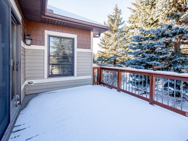 view of snow covered deck