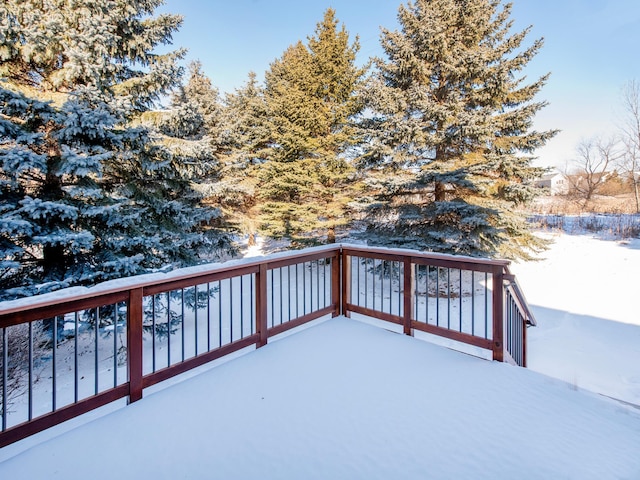 view of snow covered deck