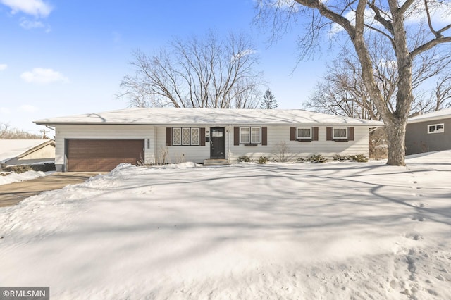 view of front of property with an attached garage and driveway