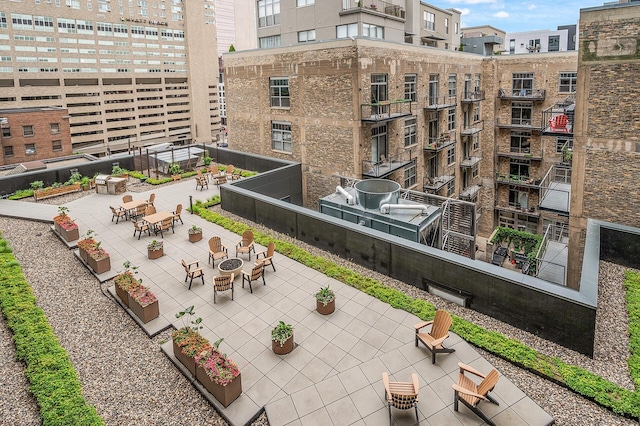 exterior space featuring a fire pit and a patio