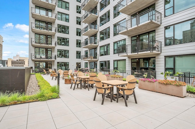 exterior space featuring outdoor dining area and a patio