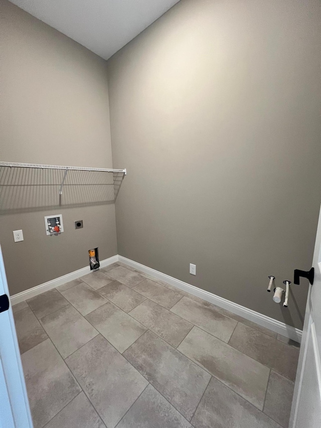 washroom featuring gas dryer hookup, hookup for a washing machine, laundry area, baseboards, and electric dryer hookup