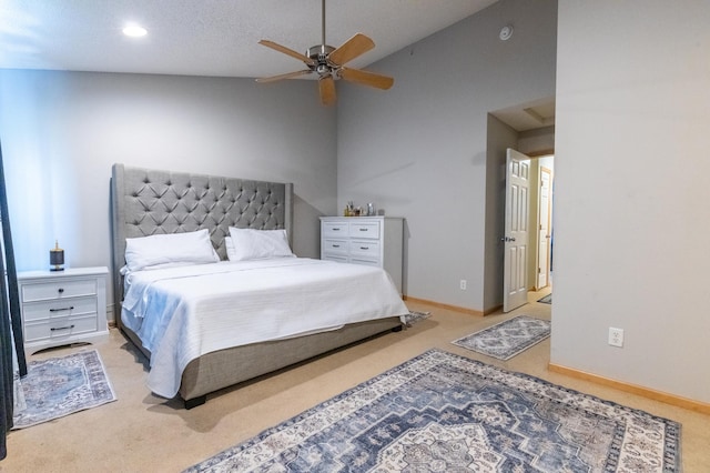 bedroom featuring lofted ceiling, recessed lighting, light carpet, and baseboards