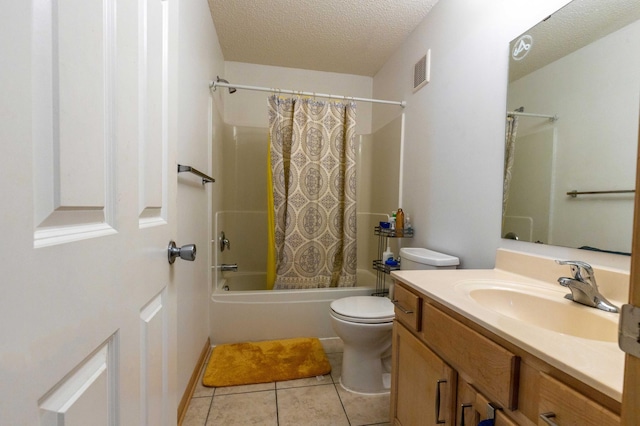 bathroom with toilet, tile patterned flooring, shower / bathtub combination with curtain, a textured ceiling, and vanity