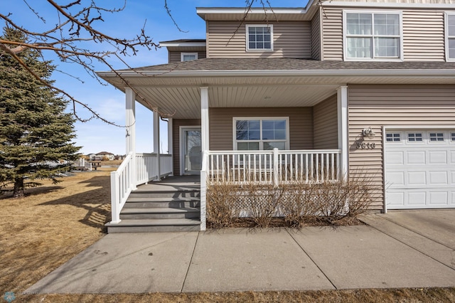 view of front of home with a porch and roof with shingles