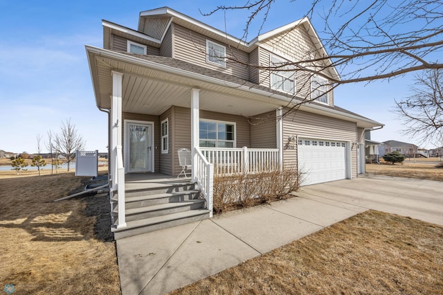 view of front of home with covered porch and driveway