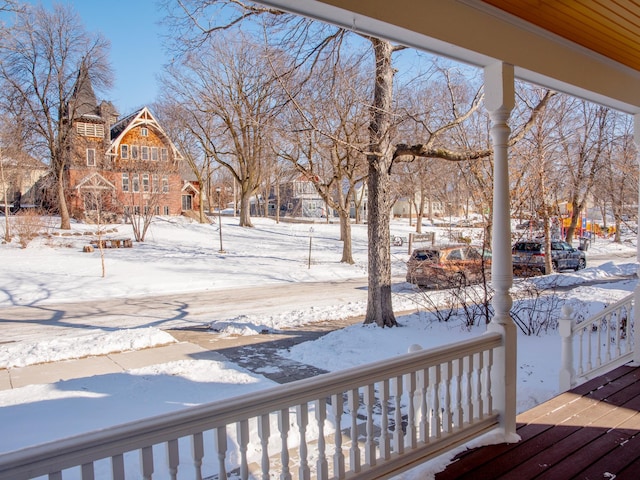 view of snow covered deck