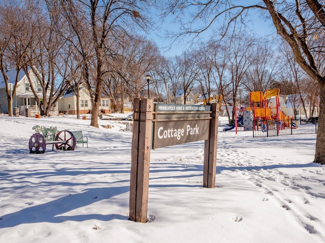 view of home's community featuring playground community