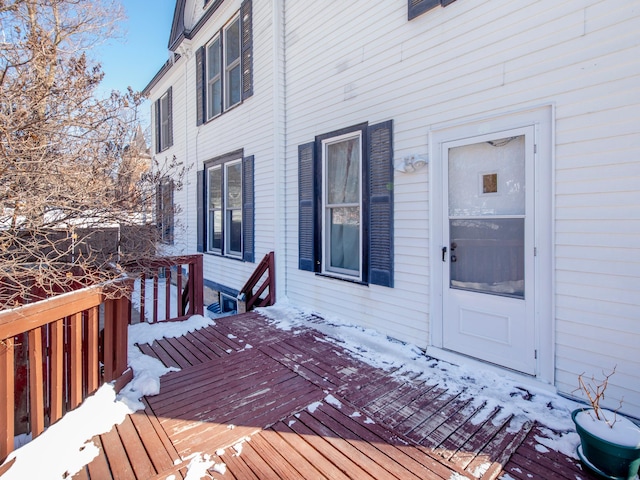 view of snow covered deck