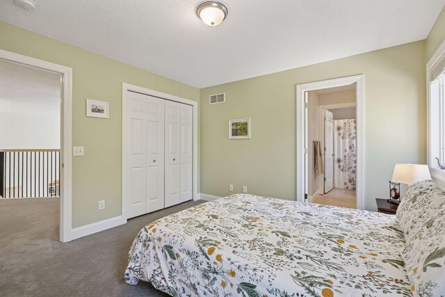 bedroom featuring a closet, carpet floors, and baseboards