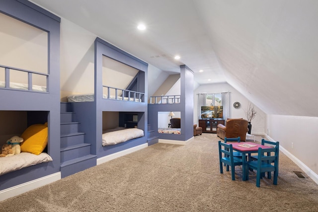 bedroom with carpet floors, lofted ceiling, baseboards, and recessed lighting