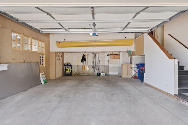 garage featuring a garage door opener