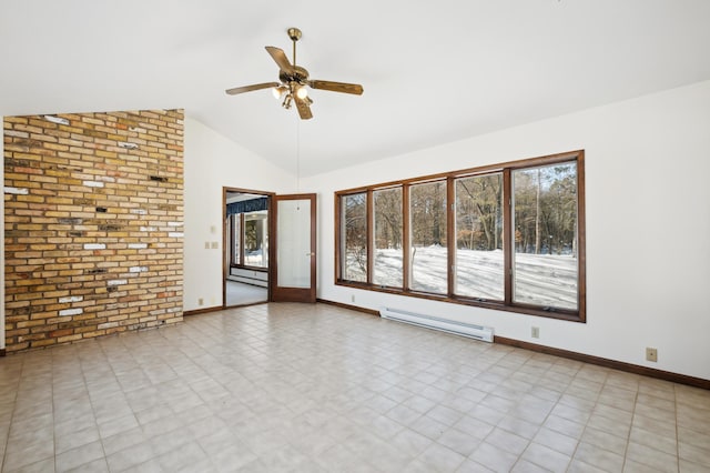 spare room featuring lofted ceiling, baseboard heating, a ceiling fan, brick wall, and baseboards