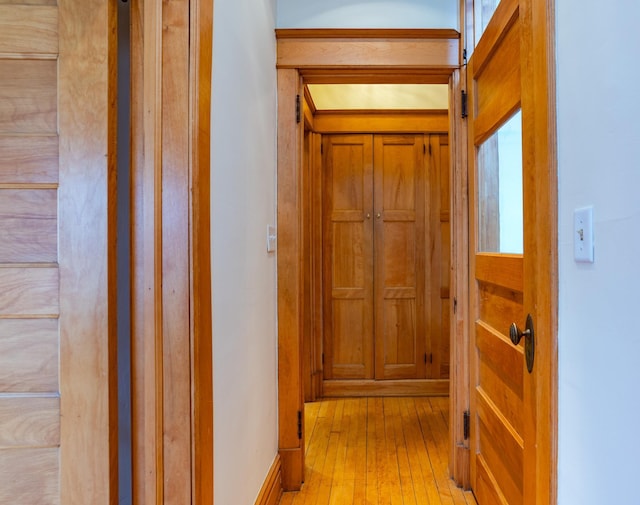 hallway featuring light wood-type flooring