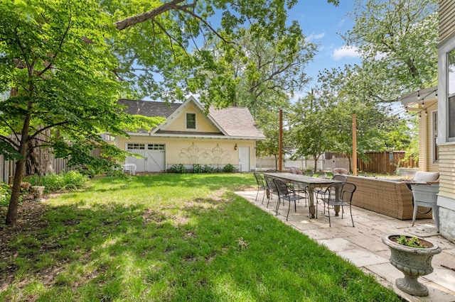 view of yard with a fenced backyard and a patio