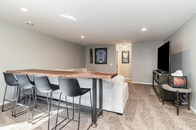 bar featuring carpet floors, a dry bar, baseboards, and recessed lighting