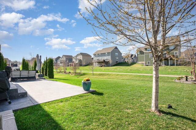 view of yard featuring a residential view