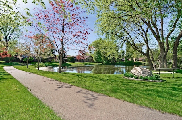 1021 Yuma Ln N, Plymouth, MN 55447 - view of property's community featuring a water view and a lawn