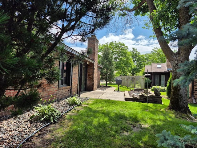 1021 Yuma Ln N, Plymouth, MN 55447 - view of yard featuring a patio