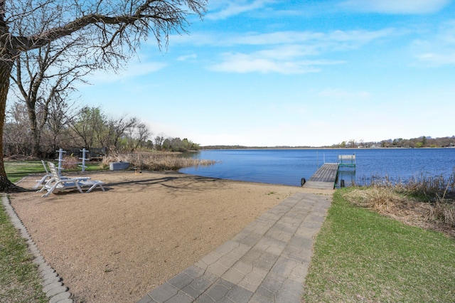 view of water feature with a dock