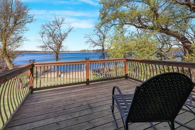 deck featuring a water view