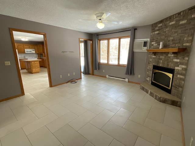 unfurnished living room featuring baseboards, a wall unit AC, ceiling fan, baseboard heating, and a fireplace