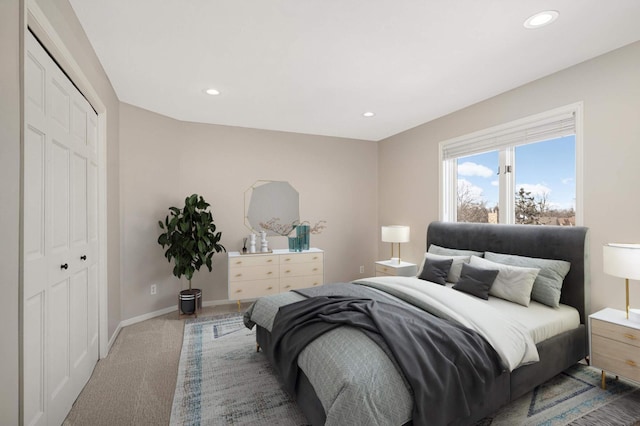 carpeted bedroom with recessed lighting, a closet, and baseboards