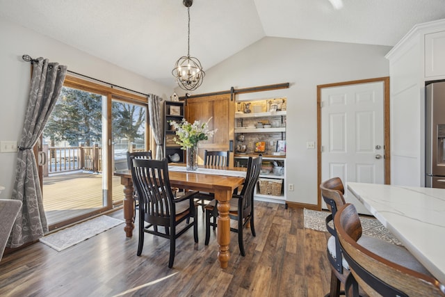 dining space featuring dark wood-style floors, a chandelier, and vaulted ceiling