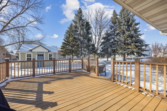 wooden deck with an outdoor structure