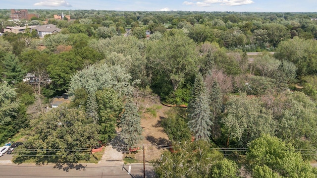 bird's eye view featuring a view of trees