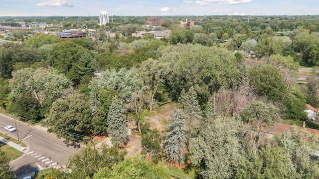 drone / aerial view with a view of trees