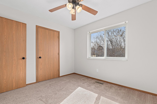 270 Magnolia Dr, Cady Twp, WI 54013 - unfurnished bedroom featuring carpet flooring, baseboards, and ceiling fan